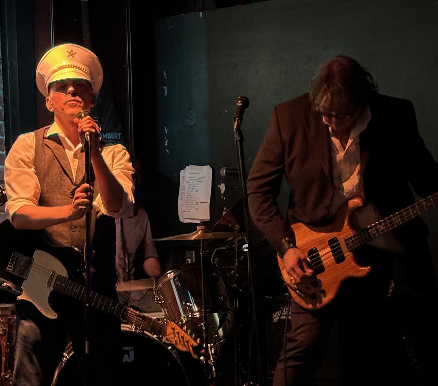 Cheap Licks vocalist and bassist on stage